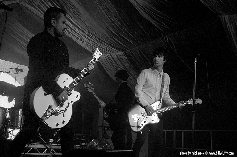 Billy Duffy onstage with Johnny Marr...