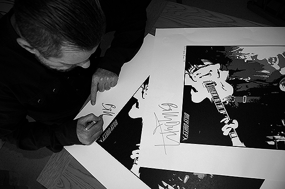 BillyDuffy signing his limited edition poster