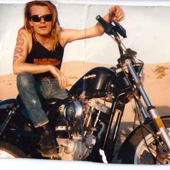 Billy Duffy on a Harley Davidson at Glamis Dunes, California 1988