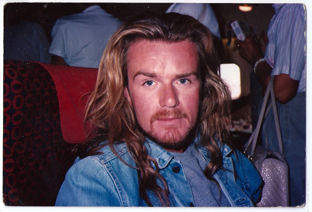 Billy Duffy rockin the Jesus look on a plane home from Hawaii 1990